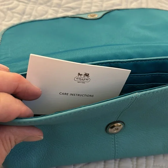 NWOT Coach large flap wristlet. - Picture 5 of 10